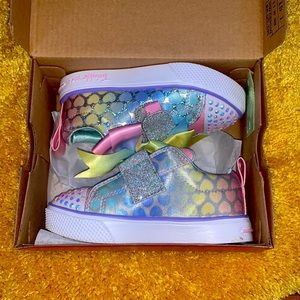 Light up twinkle toes by Skechers never worn
